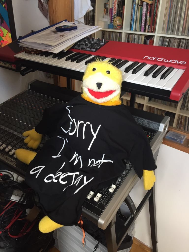Radioslave's puppet wearing Spoon My t-shirt 